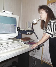 image: woman using assistive technology