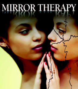 Woman looking in mirror with a cracked reflection